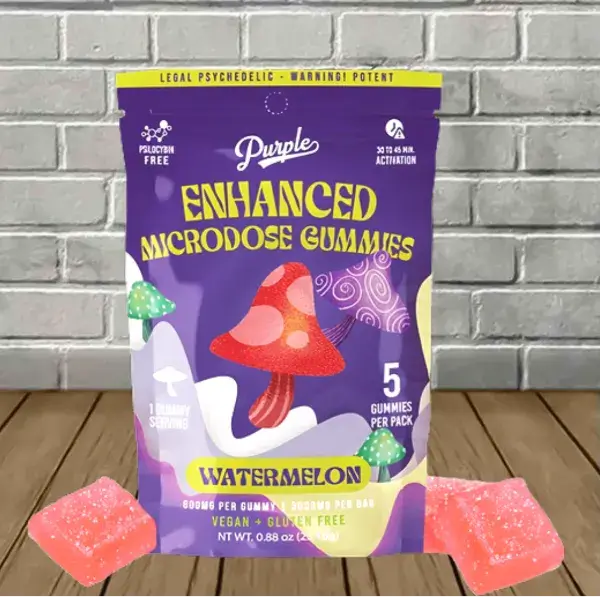 Purple Enhanced Microdose Watermelon Gummies pack with vibrant gummies on wooden table, featuring 5 count, vegan and gluten free.