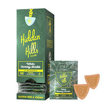 Hidden Hills Club Delta Blend edibles package with gummy shapes, featuring 1000MG, gluten-free and vegan.